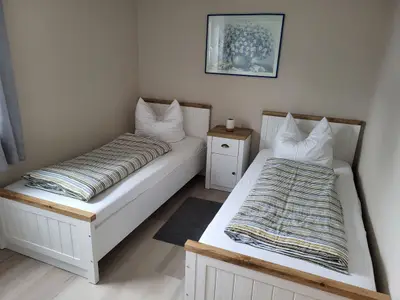 Schlafzimmer mit Einzelbetten