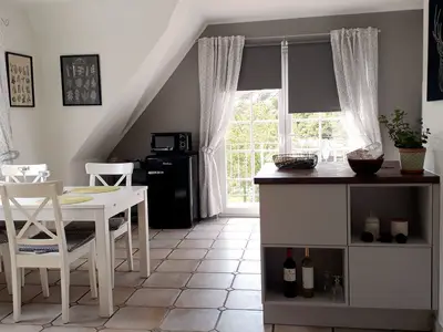 Essbereich mit TV und Küche