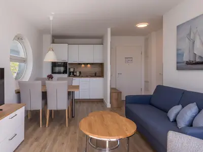 Ferienwohnung Kleine Freiheit Blick auf die Küchenzeile im offenen Wohnbereich