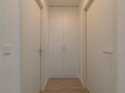 Ferienwohnung Kleine Freiheit Blick auf den Flur mit großem Kleiderschrank