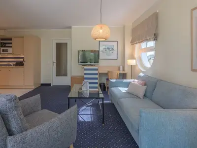 Ferienwohnung Grasnelke in Zingst offener Wohnbereich mit Küche