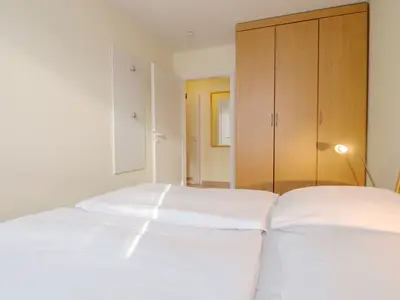 Schlafzimmer mit Doppelbett