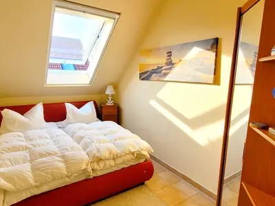 Schlafzimmer mit Doppelbett