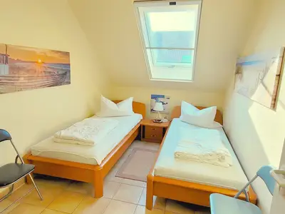 Schlafzimmer mit Einzelbetten