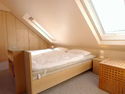 Schlafzimmer mit Doppelbett