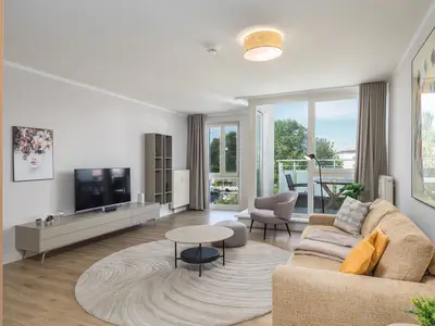 Ferienwohnung Windflüchter Aparthotel Zingst - offenes Wohnzimmer