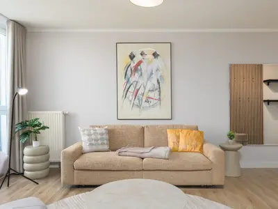 Ferienwohnung Windflüchter Aparthotel Zingst - Wohnzimmer Sofa