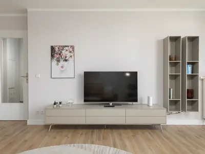 Ferienwohnung Windflüchter Aparthotel Zingst - Wohnzimmer mit TV