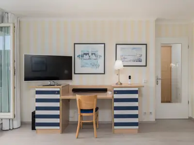 Ferienwohnung Dünensand Zingst Wohnzimmer mit TV