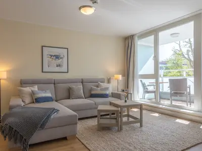 Ferienwohnung Herzmuschel Aparthotel Zingst - WohnzimmerWohnzimmer mit direktem Zugang zum Balkon