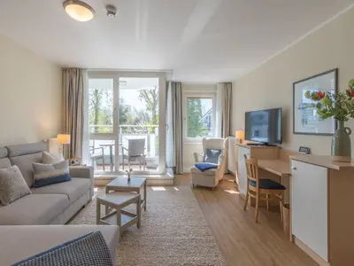 Ferienwohnung Herzmuschel Aparthotel Zingst - Blick in den offenen Wohnbereich