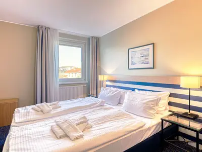 Ferienwohnung Ankerplatz Aparthotel Zingst - Schlafzimmer