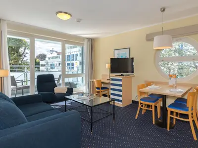 Ferienwohnung Bernsteinwind in Zingst - Wohnzimmer mit Ausblick