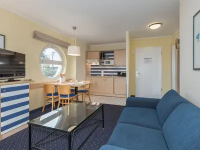 Ferienwohnung Bernsteinwind in Zingst - Wohnbereich mit offener Küche