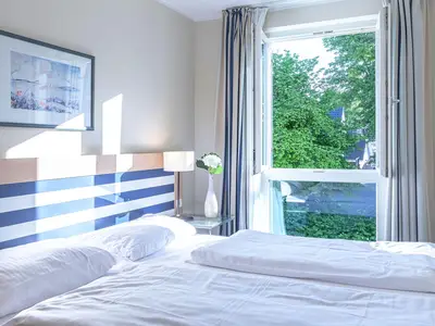 Ferienwohnung Bernsteinwind in Zingst - Schlafzimmer Bett