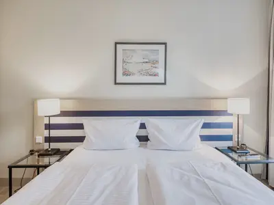 Ferienwohnung Ostseeanker in Zingst gemütliches Doppelbett im Schlafzimmer