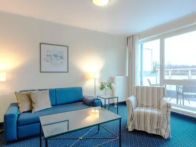 Ferienwohnung Deichkieker Aparthotel Zingst - Wohnzimmer mit Deichblick