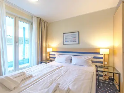 Ferienwohnung Deichkieker Aparthotel Zingst - Schlafzimmer