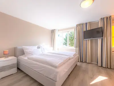 Ferienwohnung Kapitän Ed Aparthotel Zingst - Schlaffzimmer
