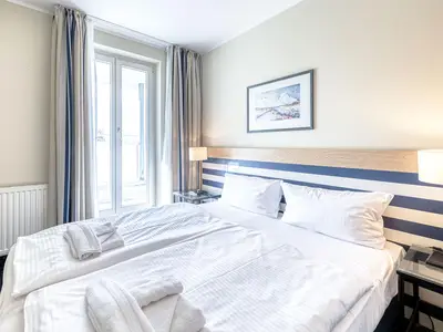 Ferienwohnung Grevenburg Aparthotel Zingst - Schlafzimmer