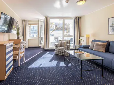 Ferienwohnung Deichperle Aparthotel Zingst - Wohnzimmer