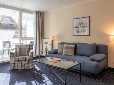 Ferienwohnung Deichperle Aparthotel Zingst - Wohnbereich Sitzecke