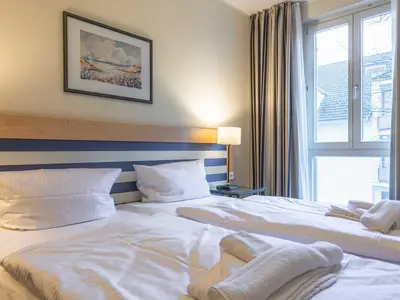 Ferienwohnung Deichperle Aparthotel Zingst - Schlafzimmer