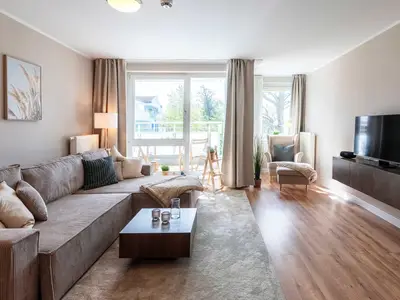 Ferienwohnung Aparthotel Zingst Heymat - Wohnzimmer