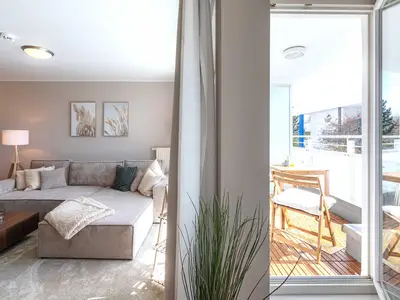 Ferienwohnung Aparthotel Zingst Heymat - Wohnzimmer
