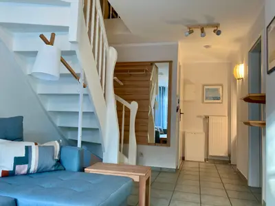 Wohnbereich mit Treppe ins Obergeschoss