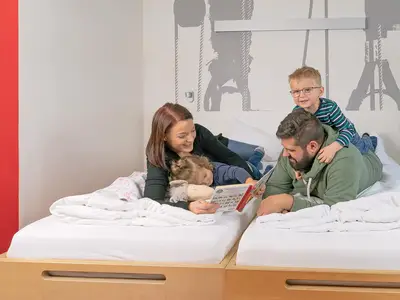 Familie im Bett