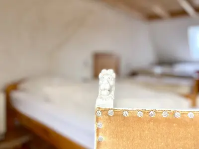 Detail Löwe an der Stuhllehne