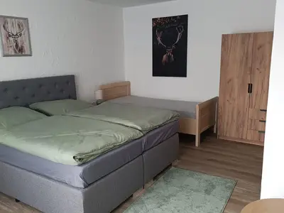 Dreibett-Zimmer