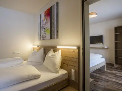 Standard Connect, Familienzimmer im COOEE alpin Hotel Dachstein