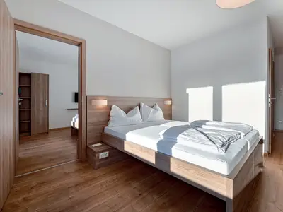 Standard Connect, Familienzimmer im COOEE alpin Hotel Dachstein