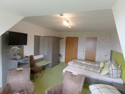 Dreibettzimmer