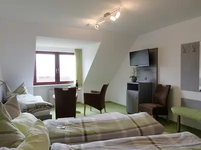 Dreibettzimmer