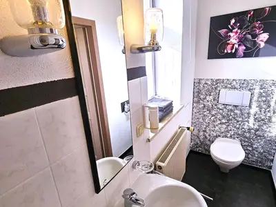 Dreibettzimmer Badezimmer