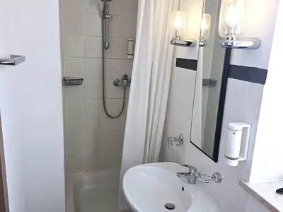 Badezimmer Dreibettzimmer