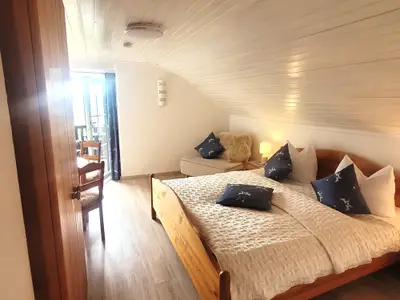 Zimmer 8 / Erde / Dreibettzimmer