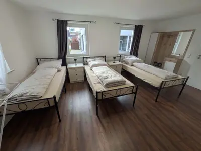 Dreibettzimmer 1 "Home"