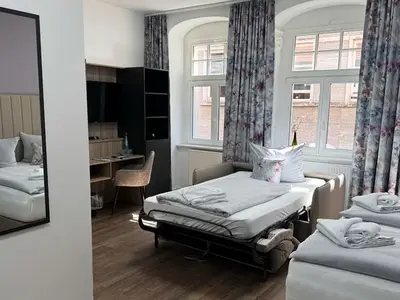 Mehrbettzimmer für 3 Personen (25 m²) 9/10
