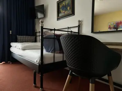 Dreibettzimmer