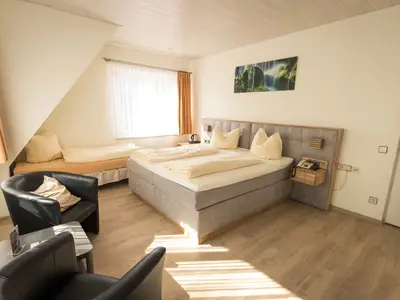 Dreibettzimmer
