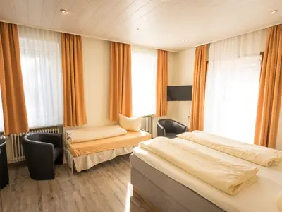 Dreibettzimmer