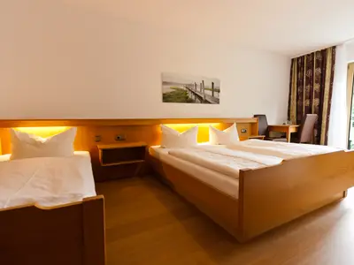 Dreibettzimmer mit DuWC