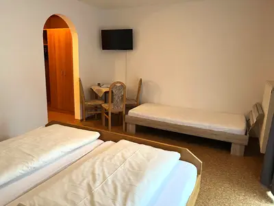 Dreibettzimmer 1.2
