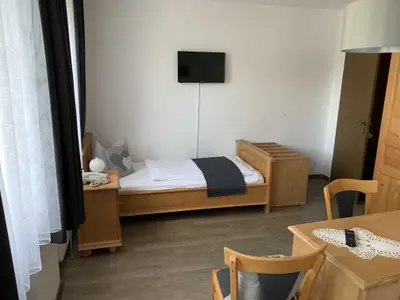 Dreibett-Zimmer