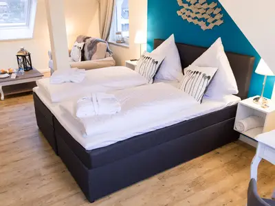 kombinierter Wohn- und Schlafbereich in der Junior Suite