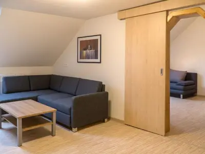 Familiensuite - Wohn,- und Schlafraum